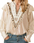 Souvenir blusa con perline