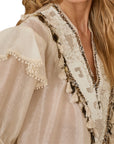Souvenir blusa con perline